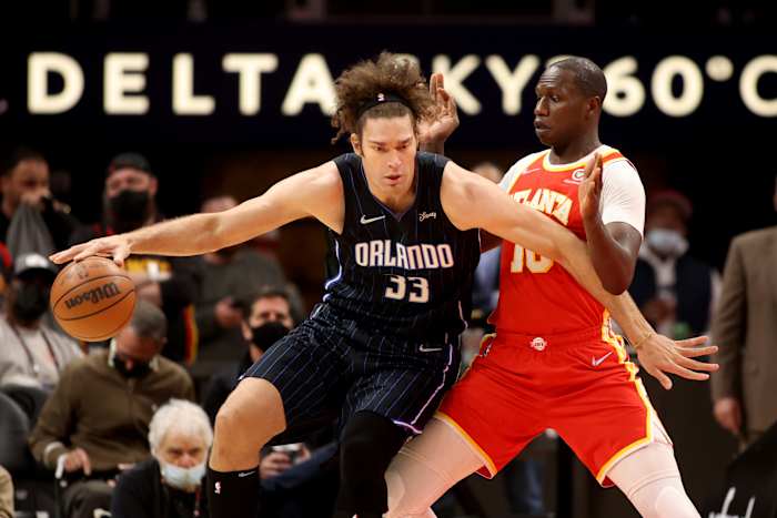Orlando Magic center Robin Lopez (33) makes a move against Atlanta Hawks center Gorgui Dieng (10) during the first quarter at State Farm Arena.